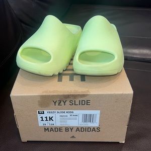 Neon green Yeezy slides
